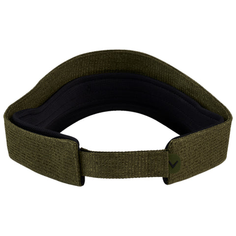 A green fabric headband is positioned flatly showing its inner black lining and a tag with a logo. It is designed to fit on the head for comfort and style.