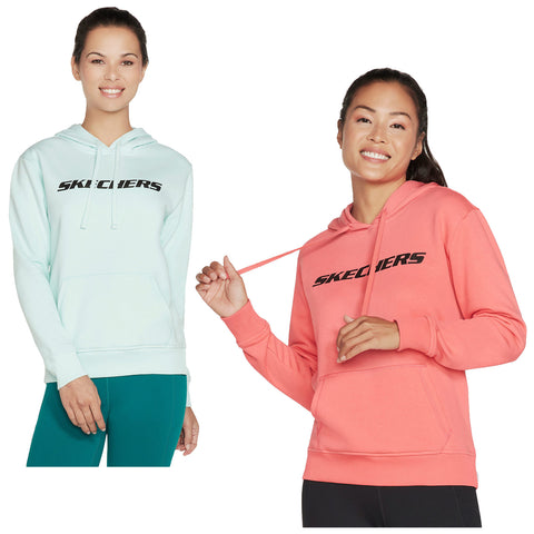 Two women are showcasing hoodies with the brand name Skechers prominently displayed. One wears a light blue hoodie and the other wears a coral hoodie, both appearing happy in casual attire.