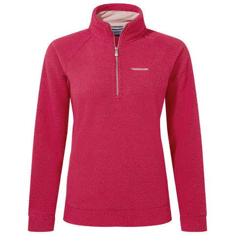 A pink, textured fleece pullover features a quarter-zip collar designed for comfort. The garment is displayed against a plain background highlighting its color and style.