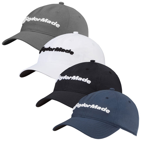 Four baseball caps are displayed in a row featuring different colors gray white black and dark blue all adorned with the embroidered logo TaylorMade on the front