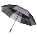 A black and gray umbrella is opened with a sturdy shaft and handle in a neutral space designed to provide protection from rain or sun.