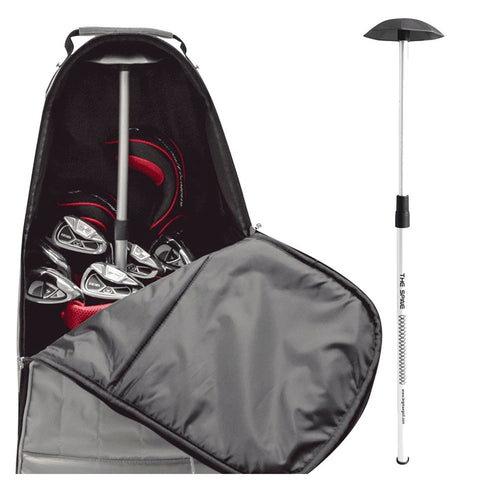 A black golf bag contains several golf clubs with grey and red grips visible inside while a detachable device labeled "THE SPINE" stands upright next to the bag.