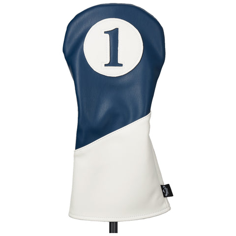 A blue and white golf headcover is displayed upright featuring a circular patch with the number one adorned prominently on the front set against a plain background.