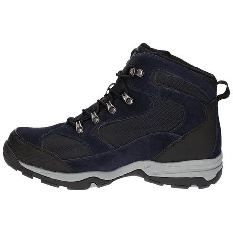 A dark blue hiking boot features a suede and mesh design with a thick rubber sole and metal eyelets for laces set against a plain white background.