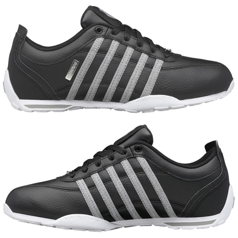 Black athletic shoes with grey stripes are displayed from two angles highlighting their sleek design and lace-up feature set against a plain white background emphasizing their color and style.