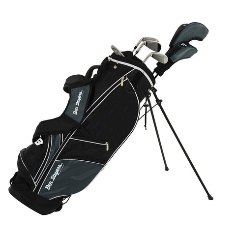 A black golf bag with a stand holds golf clubs inside it positioned upright on the ground in a neutral setting with no visible context or scenery.