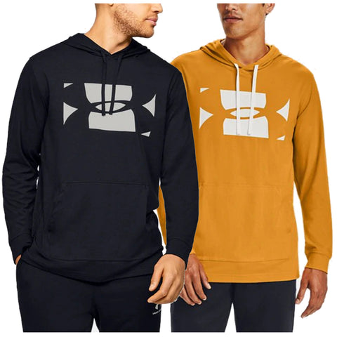 Two men wear hooded sweatshirts featuring a prominent logo. One is in black while the other is in mustard yellow. They are standing side by side, showing contrasting styles.