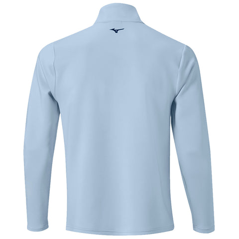 A light blue long-sleeve garment with a collar is displayed from the back showing a logo at the neck area in dark blue