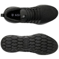 A black athletic shoe displays a textured upper with laces on top and a patterned rubber sole below showcasing the brand K-Swiss in the center.