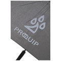 A gray umbrella with the logo "PROQUIP" prominently displayed is positioned upright, suggesting it's being used for protection against rain or sun in an outdoor setting.