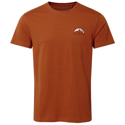 A short-sleeved orange t-shirt displays a small logo featuring mountains and the word "ADVENTURE CRAGHOPPERS," positioned on the upper left side, suitable for casual outdoor activities.