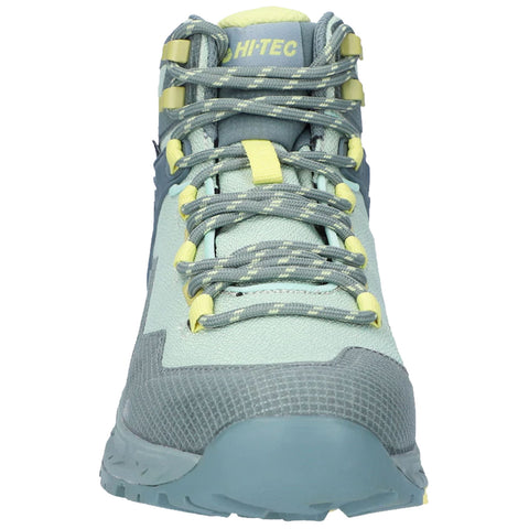 A light blue hiking shoe features gray and yellow accents with tied laces displayed directly facing the viewer against a plain background suggesting an outdoor or active context.