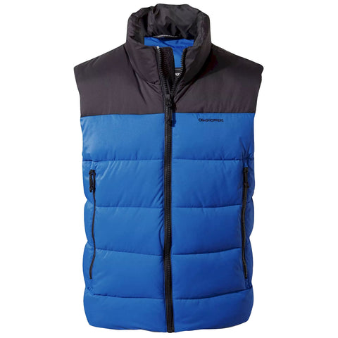 A blue padded vest with a black upper section is displayed. It features a front zipper and a side pocket, designed for warmth and comfort in outdoor conditions.