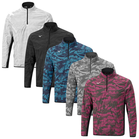 Five athletic jackets hang in a row displaying various colors and camouflage patterns showcasing their design features including a quarter zipper and high collars against a plain background