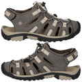 A pair of outdoor sandals displays a breathable design with cutouts and straps providing support and comfort suitable for walking in various terrains with a durable rubber sole