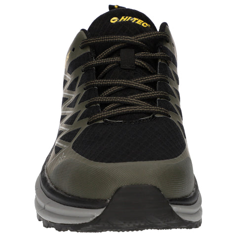 A sports shoe features a black mesh upper with green accents and textured detailing laces are threaded through eyelets at the front designed for running or outdoor activities.