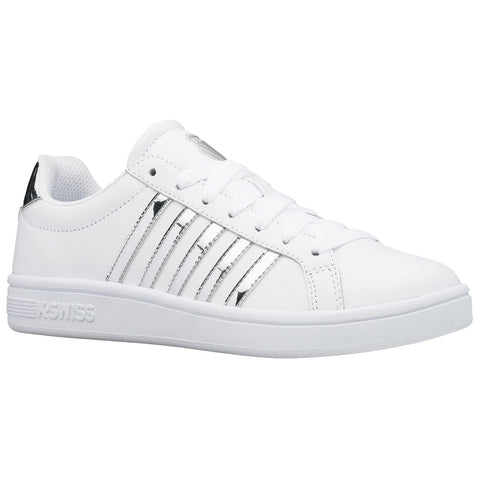 A white sneaker with a smooth design features metallic stripes and laces. It is positioned against a plain backdrop emphasizing its clean aesthetic. The brand name is subtly embossed on the side.