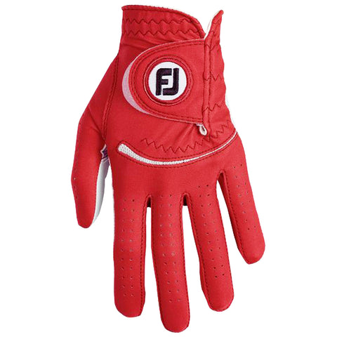 A red golf glove with perforated fingers is positioned upright showcasing its design and grip features intended for improved performance during golfing in an outdoor sports environment.