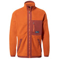 A warm orange fleece jacket with a high collar features a chest pocket and side pockets in a contrasting reddish-brown color designed for casual outdoor wear