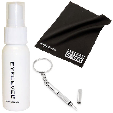 A white spray bottle labeled EY LEVEL Lens Cleaner sits next to a black microfiber cleaning cloth marked EY LEVEL READERS and a silver pen keychain with a removable cap on a white background.