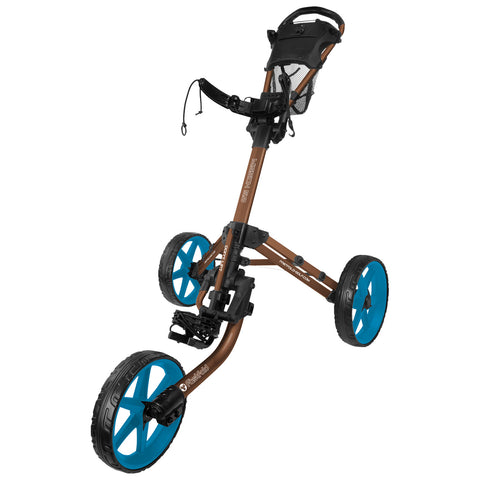 A golf push cart with a sturdy brown frame and large blue wheels is positioned upright showcasing its handle and a mesh storage area, designed for carrying golf bags on courses.