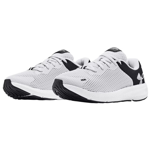 Two pairs of athletic shoes are positioned side by side displaying a mesh upper in white with black accents the shoes are designed for running or training activities.