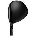 A black golf driver rests upright showcasing its large head designed for striking the ball with precision in a golf course setting where players seek distance and accuracy.