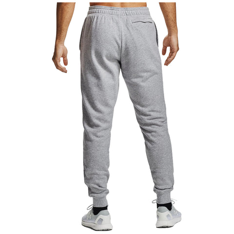 Gray sweatpants are displayed standing upright they feature an elastic waistband with a drawstring and tapered cuffs designed for comfort and casual wear in an indoor or outdoor setting.