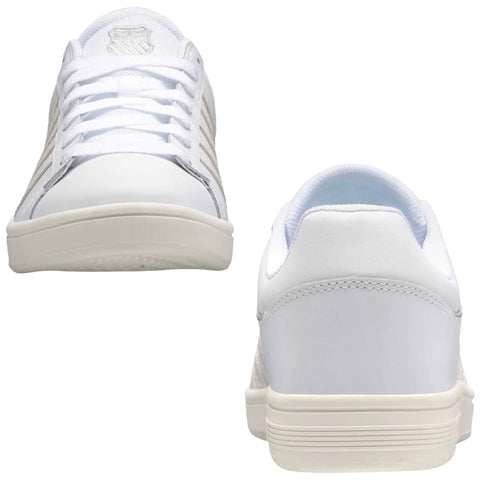 A pair of white sneakers sits facing forward and backward showcasing a smooth surface design with laces on the front and a padded collar at the back against a plain background.