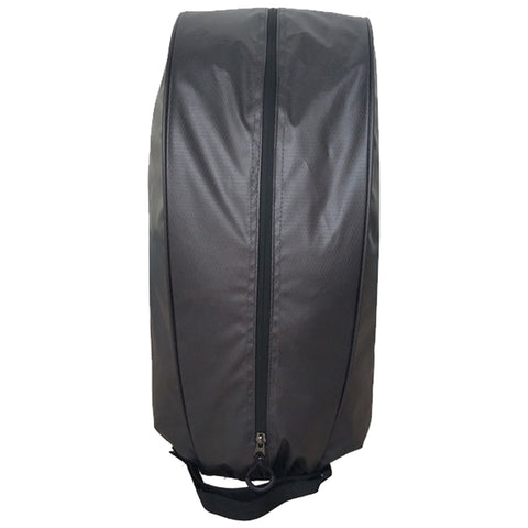 A cylindrical black bag stands upright with a top zipper and a side handle the material appears slightly textured suggesting durability suitable for carrying items securely.