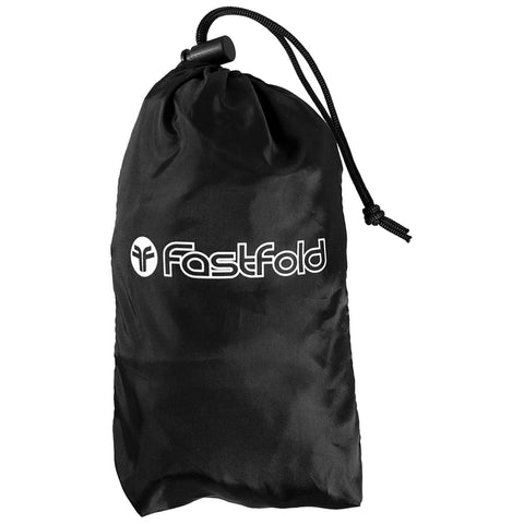 A black drawstring bag branded with "Fastfold" holds various items inside while resting against a neutral background suggesting storage or travel use.