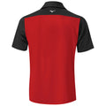 A polo shirt with a red body and black sleeves hangs, displaying a simple design and a collar, suitable for casual or athletic wear. The brand logo is located on the back.