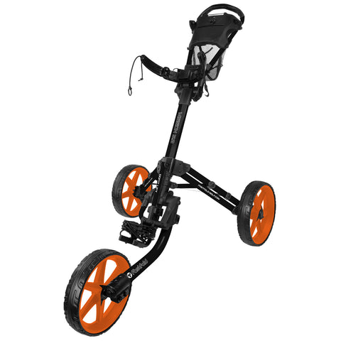 A black and orange golf push cart stands upright on three large wheels with a foot pedal mechanism attached for movement in an outdoor golfing environment.