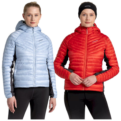 Two women stand side by side modeling different lightweight jackets. One wears a light blue puffy jacket and the other a bright red one. Both have their arms at their sides.