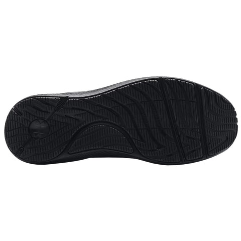 A black shoe sole is displayed showcasing its tread patterns and textures the object indicates durability and grip highlighting its design for athletic or casual use