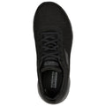 A black athletic shoe sits upright showcasing its mesh upper and laces designed for comfort and support in a casual or sports environment with branding visible on the side and inside.