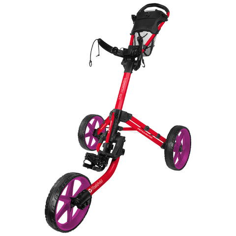 A red golf push cart with purple wheels is positioned upright showcasing its sturdy frame and handle designed for transporting golf bags across various terrains.