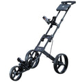 A black golf push cart is positioned upright featuring three wheels a handle for steering and a storage area for golf gear in a plain white background