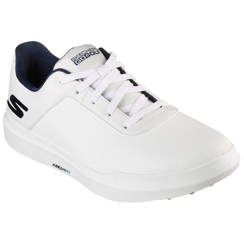 A white golf shoe is positioned prominently with a smooth leather exterior featuring a navy accent on the tongue and a branded logo on the side designed for comfort and performance.