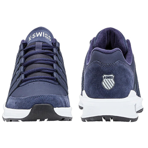 Navy blue athletic shoes are displayed with laces and a logo on the back the shoes are designed for sports or casual wear showing a modern style and durability.