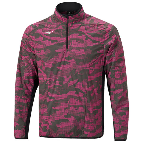 A long-sleeved jacket with a zippered collar features a pink and grey camouflage pattern suitable for outdoor or athletic activities. The design blends style with functionality in a sporty context.