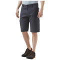 Cargo shorts are worn by a person standing with one hand resting at their side in a casual environment paired with black hiking shoes featuring orange accents.