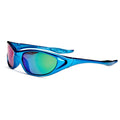 Blue mirrored sunglasses rest on a white background reflecting various colors in the lenses and showcasing a sleek design suitable for kids with distinctive angles and curves.