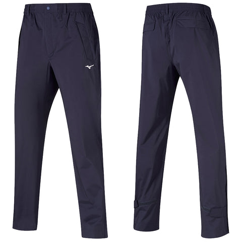 Navy athletic pants feature an elastic waistband with pockets and a logo. They are designed for active wear and suitable for outdoor activities in varying weather conditions.