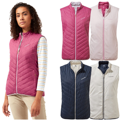 A woman wearing a pink sleeveless vest stands confidently while showcasing various colored vests arranged beside her in a clean, neutral background. The vests are designed for outdoor use.