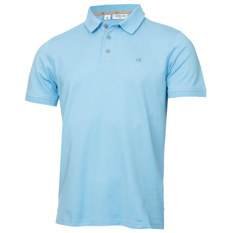 A light blue polo shirt featuring a buttoned collar and short sleeves is displayed against a plain background emphasizing its color and style with a small logo visible on the left side.