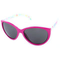 Pink sunglasses are displayed with oversized cat-eye frames and dark lenses resting against a plain white background showcasing their vibrant colors and playful design on the temples.