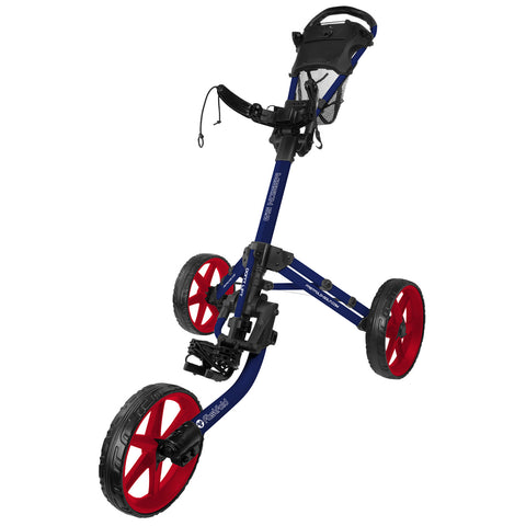 A blue and red golf push cart stands upright featuring three wheels including two large red ones and one smaller black one with a handle for maneuvering and a storage compartment.