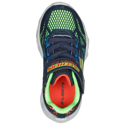 A children's athletic shoe is displayed from above featuring a navy blue and neon green mesh design with bright accents laced up with a strap and labeled S-LIGHTS on the side.