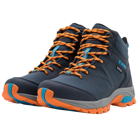 A black hiking boot with blue accents is positioned vertically displaying its laces and tongue amidst a neutral background highlighting its durable design and rugged features.